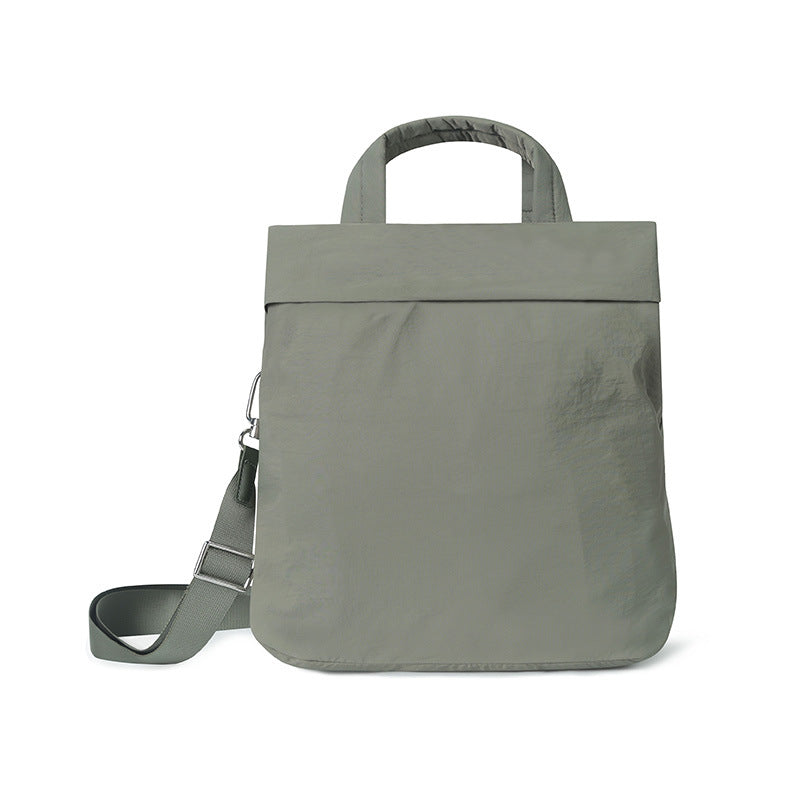 Simple, waterproof, large-capacity hand-held and crossbody dual-use bag