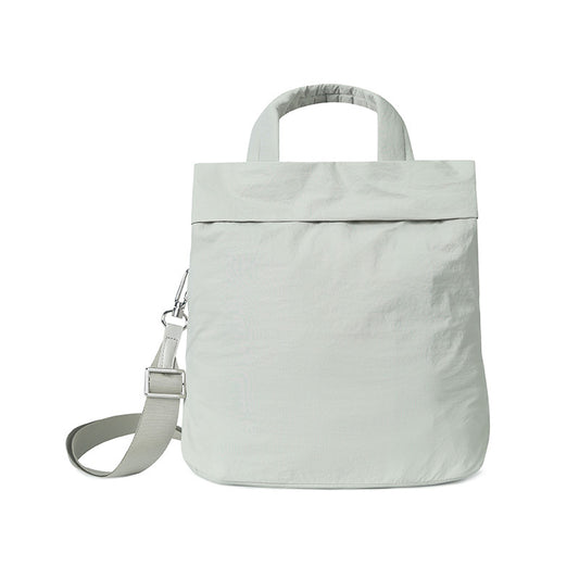 Simple, waterproof, large-capacity hand-held and crossbody dual-use bag